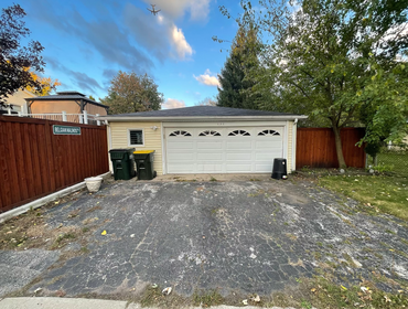 Detached Garage Rebuild with Drainage Improvements This project replaced a flood-prone garage setup with a new detached garage, upgraded foundation, ne