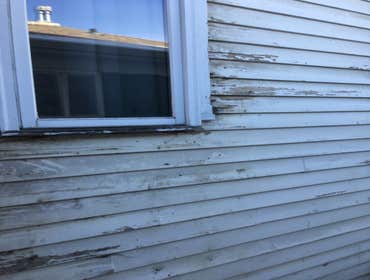 Photos by Inside Out Roofing and Restorations #2 Before and during of an Installation of HARDIE BOARD lap lsiding OVER existing cedar shingles,
Stay t