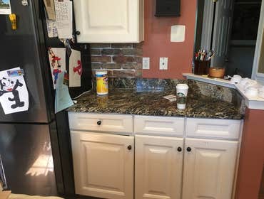 BRICK BACKSPLASH WITH UNDER CABINET LIGHTING