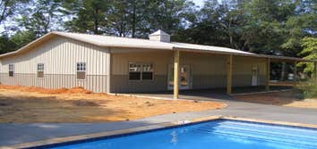 Cooper Job 26' x 48' Pole builing with (2) 12' x 48' lean-tos. Used for garage and pool house.