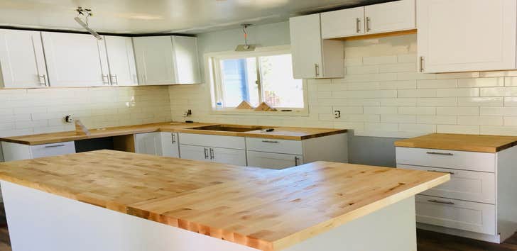Photos by Oregons Premium Remodel LLC #1 Remove old kitchen, install new kitchen cabinets with island. new butcher block countertops and subway tiles