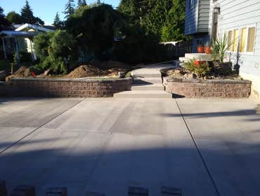 Photos by Rc Healthy Lawns #1 Full yard restoration pavers, retaining walls, vegetable gardens, flower beds, sod, shrugs ,plants and trees.