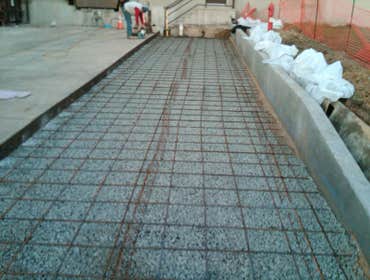 pouring concrete in a driveway