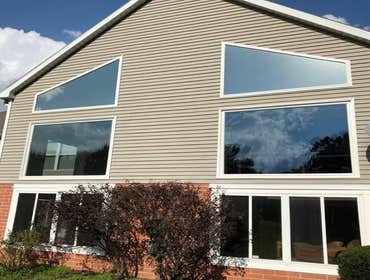 Photos by Professional Window Installers #1 Large bow and 8 windows. Fiberglass Andersen’s for this project