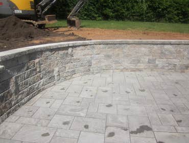 Photos by Dunn Landscape Construction #1 After initial pool installation provide all hardscape including retaining walls, pool deck, walkways and plant