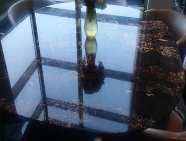 Restored Portoro marble table top.