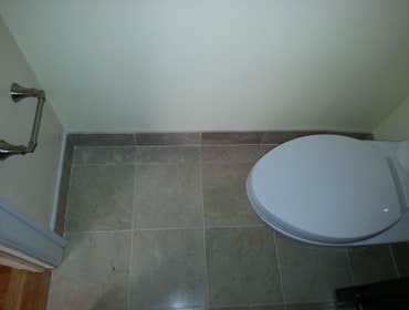 Singh Powder Room This was a simple powder room all old tile and fixtures were removed and replaced with new..