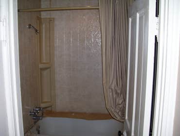 Johnson Bathroom This bathroom renovation had all old fixtures removed and updated with new fixtures, bathtub, toilet, vanity and ceramic tile on wall