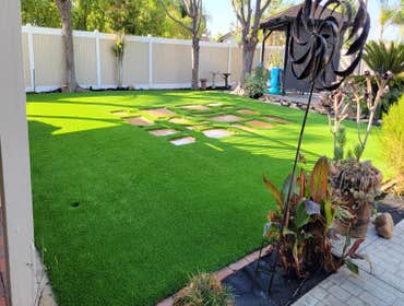 Photos by Jz Synthetic Products #3 Flagstone, with beautiful turf all around..
A great flagstone install with some high quality turf to add to its beau