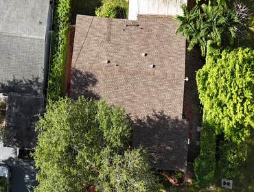 Photos by Gold Star Miami Corp #1 metal roof panels all are . 25 years warrantee