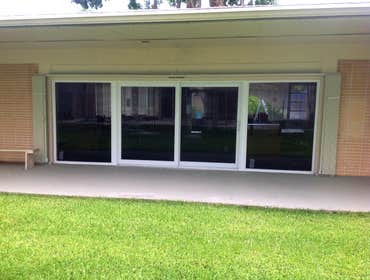 Unity School Removed non-impact sliding glass doors and replaced with impact sliding glass doors.