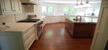 Kitchen Remodel; Central NJ A very large, High End Kitchen with mixed Cherry and White Cabinets. Granite center island and white Marble perimeter coun