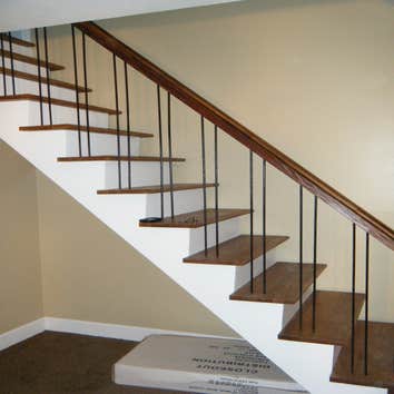 Rental property rehab Complete renovation including roofing, siding, windows, doors, kitchen, bathrooms, tile, hardwood flooring, trim work, and painti