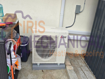 Mitsubishi multizone mini split installation Old wall heater replacement, mini-split installation, ductless heat pump upgrade, gas wall heater removal,