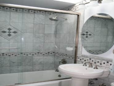 Classic Bath remodel, San Francisco In the bathroom, we decided to bring back some of that classic 40's marble tile detail, with some modern accents in
