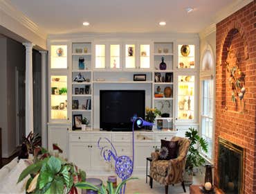 Photos by Talon Construction Inc of N. Potomac living room White built-in wall cabinets in family room remodel in Potomac Maryland