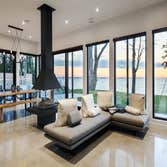 Project 14-513 Inspired by our 80’s collection, the home is built on a flat lot with a spectacular view of Lake St-Francois. This architectural work is
