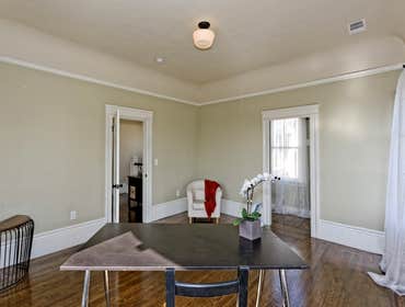 846 52nd St We took this showcase house and we brought out the inner beauty. It had been converted into a duplex, and we restored it to its original, s