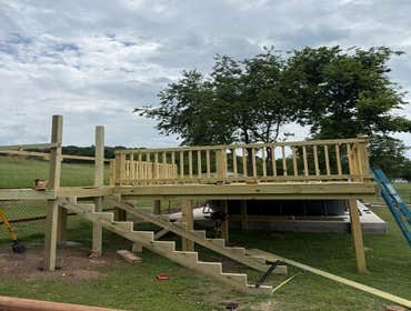 Photos by Fjm Remodeling #1 Above pool 16x16 deck