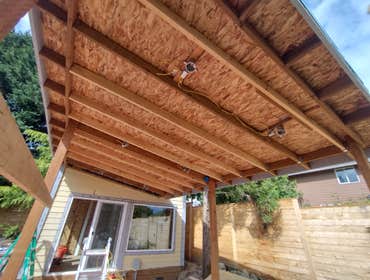 Photos by Stewart & Son Gate & Fence LLC #1 Tiny House with pergola. Small house 17' by 12' small bathroom with pocket door, and small sink with water 