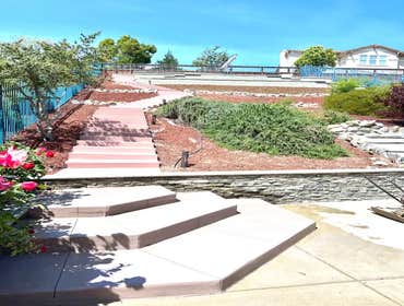 Photos by Cal Valley Landscape #8 Hill side top backyard project work with city inspection pass.
Retaining wall, deck, travertine install, steps and mu
