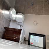 Photos by Head to Toe Home Improvement #3 We built this bathroom to include a beautiful shower next to the guest room.