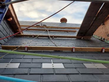 Photos by Premier Ny Building Inc #1 New Roofing job