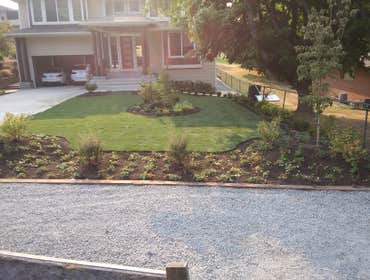 Photos by Rc Healthy Lawns #1 Full yard restoration pavers, retaining walls, vegetable gardens, flower beds, sod, shrugs ,plants and trees.