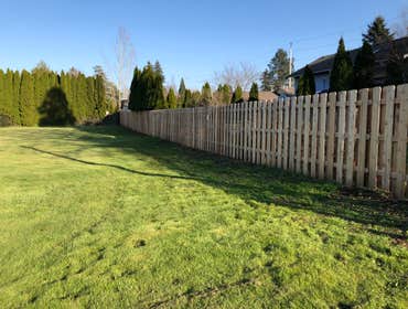 Photos by 4 Sons Fencing LLC #1 Good neighbor fence, with 3 rails, steel posts, and 3/4 fence boards. A fence built to last!!