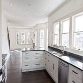 Rustic Meets Modern This remodel of a third floor and attic living space is located in Cambridge, MA. The house was designed to incorporate a rural vi