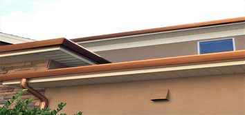 7" Contemporary Gutters with 4" Round Downspouts