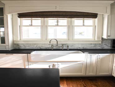 Baine Contracting Inc Project Multiple jobsites - showing kitchens, interior and exterior trim work, new homes, bathrooms, tile work, wood and iron ra