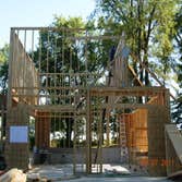 Garage Design and Build Our client wanted a large garage and porch designed to match the style of their home.