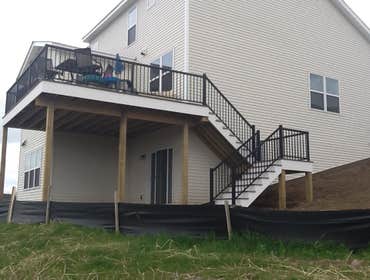 Photos by Custom Home Specialties Inc #2 Timber Tech maintenance free decks with powder coated railings.
