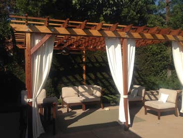 Sherman Oaks New pergola with outdoor fans and lighting.