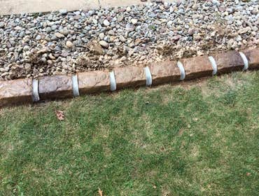 Hanover area we installed curbing around a retaining wall