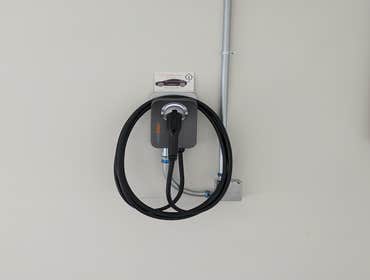 Photos by Watson's Charging Stations & Electric #1 Relocate existing EV Charger Circuit to other side of Garage and install ChargePoint Home Flex on 60
