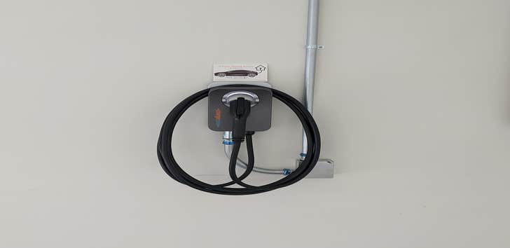 Photos by Watson's Charging Stations & Electric #1 Relocate existing EV Charger Circuit to other side of Garage and install ChargePoint Home Flex on 60