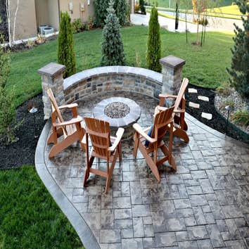 Fire pit, retaining wall, and stamped concrete