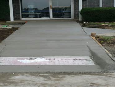 Install the handicap sidewalk in Vernon Hills