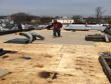Photos by Creative Builders inc Removed Old Roof and Plywood ,installed new SBS180 Rubber Roof with insulation,installed New skylights and Installed ne