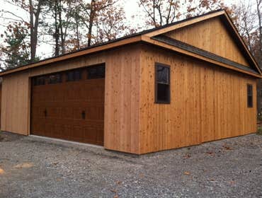 Custom Garage Custom garage with cedar vertical siding
