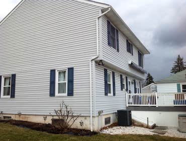 Project photos from Griesemer Construction The exterior of this porch was old deteriorated concrete with a aluminum posts & roof.Now it's trex lumber d