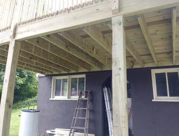 Photos by Canady Construction & Home Improvement #1 10x20 Deck with sliding glass door addition