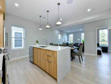 Photos by Urbanity Homes #1 Maverick St Boston MA
The Maverick Street condos are a study in materials. Simple geometries are given interest with contra