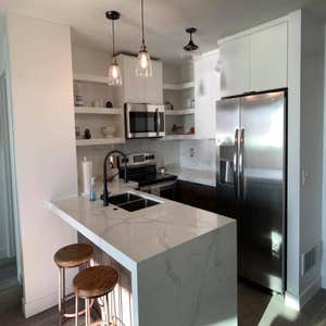 2 Condo Units ~ Oceanside, CA Two units practically taken down to the studs and the renovated, taking them out of the 70's into the 21st Century.