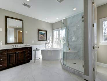 GULICK | CUSTOM Home in McLean The impressive stone and HardiePlank® elevation on our Winthrop really stood out on this corner lot of approximately one