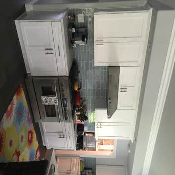 White/Grey Shaker Kitchen Remodel Entire Kitchen, Countertop project in a new construction house. White Shaker and Grey Shaker Cabinets. Quartz Counter