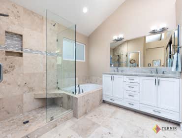 Tierrasanta Master Bath Refresh This sweet home owner wanted to keep cohesion with her tan and travertine colors existing throughout her house, but wan