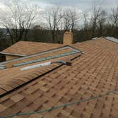 35 hundred Sq ft roof Heres a two story high roof we did. It had two layers of roofing that had to be torn off. Some of the plywood was damaged so t